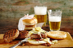 Grilled burgers with fennel and apple salad and beer