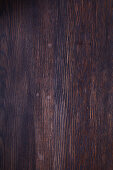 A dark wood background