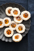 Coconut biscuits with passion fruit jelly