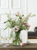 Pastel coloured early summer bouquet with poppies