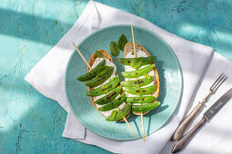 Soda bread with mint, ricotta cheese and grilled snap peas