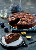 Chocolate zucchini cake with plums