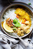 Rice with dal, potato curry and sesame fritter (India)