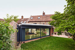 View from the garden of the Farmhouse extension into the open plan kitchen