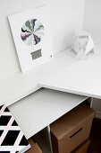 A view of a white desk and boxes