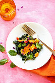 Fried potato salad with kale, carrots, mint and coriander