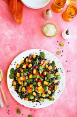 Fried potato salad with kale, carrots, mint and coriander