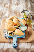 Mini calzone with lentils, spinach and feta