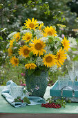 Lush bouquet of sunflowers, meadow chervil and wild carrot