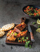 Spiced pork fillet with papaya and chilli salsa