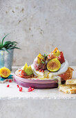 Prosciutto-wrapped figs with baked camembert