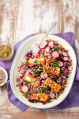 Lentil, beetroot and red radish salad with fried halloumi