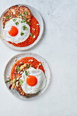 Roasted cauliflower steaks with romesco sauce and fried eggs