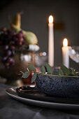 Candles on festively decorated table (detail)