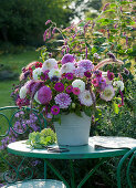 A lush bouquet of dahlias, zinnias, knotweed, and feather bristle grass