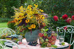 Autumn bouquet of coneflowers, Helenium, black-eyed Susans, fennel, goldenrod, and Chinese silver grass