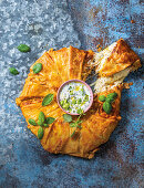 Festive party pastry wreath with chicken and cheese
