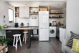 Pantry kitchen below gallery in penthouse apartment