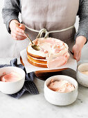 Rose Petal Cake - spreading the cake with cream
