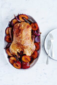 Roast duck with plums