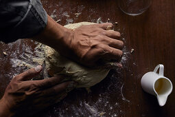 Kneading sourdough on the table