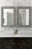 Mirrors inlaid with mother-of-pearl above twin sinks
