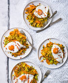 Tumeric-fried veggie rice with fried eggs