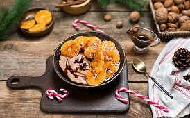 Porridge with tangerines and date syroup