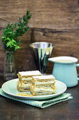 Puff pastry slices with vanilla cream (millefeuille)