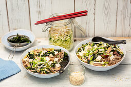 Miso soup with shiitake mushrooms, tofu, sprouts and veggies