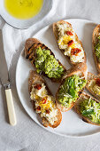 Crostini with mushy peas and hummus