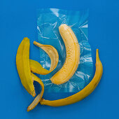 A peeled banana vacuum-packed in a plastic bag