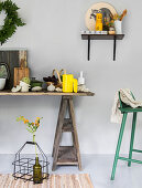 Kitchen accessories in natural shades on trestle table