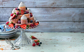 Swiss roll cake, berries, whipped cream