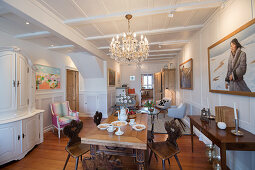 Set table in classic parlour with panelled walls