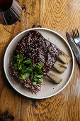 Beef ribs and green parsley with vegetable salad with wine