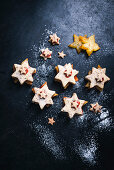 Vegan almond biscuits filled with star-fruit and jam
