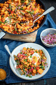 Potatoes, chickpeas and green bean stew with egg