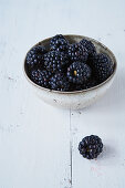 A bowl of fresh blackberries