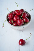 Fresh cherries in dish