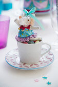Circus elephant in teacup decorating table for child's birthday party