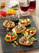A duo of bruschetta with tuna and goat's cheese