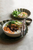Bun Bo Nam Bo - Vietnamese noodle salad with beef, rice noodles, fresh herbs, pickled vegetables and fish sauce