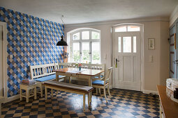 Corner bench in tiled kitchen-dining room