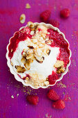 Vegan raspberry trifle with rusks and almonds
