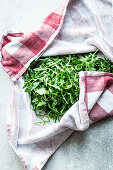 Keep rocket salad fresh in a dish towel
