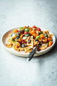 Pasta with Mediterranean summer vegetables and pesto rosso