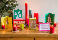 Handmade Christmas cards with motifs made from recycled paper