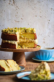 Gluten Free Lemon Almond Cake with Pistachio Frosting