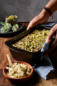 Herby nut roast with a pistachio crust and sauerkraut